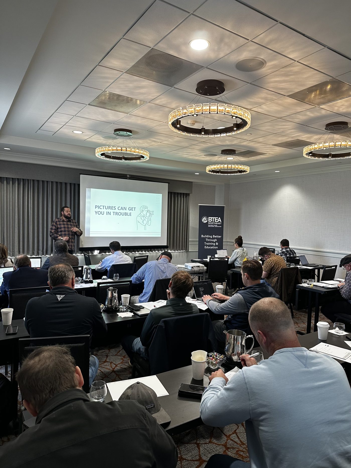Contractors working through an AI workshop hosted by BTEA Northeast